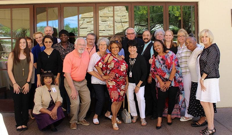 Dr. West with other volunteers at luncheon