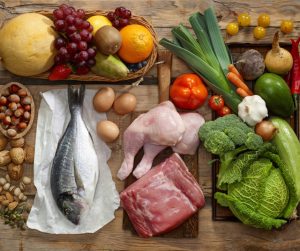 paleo food laid out on a wooden table 