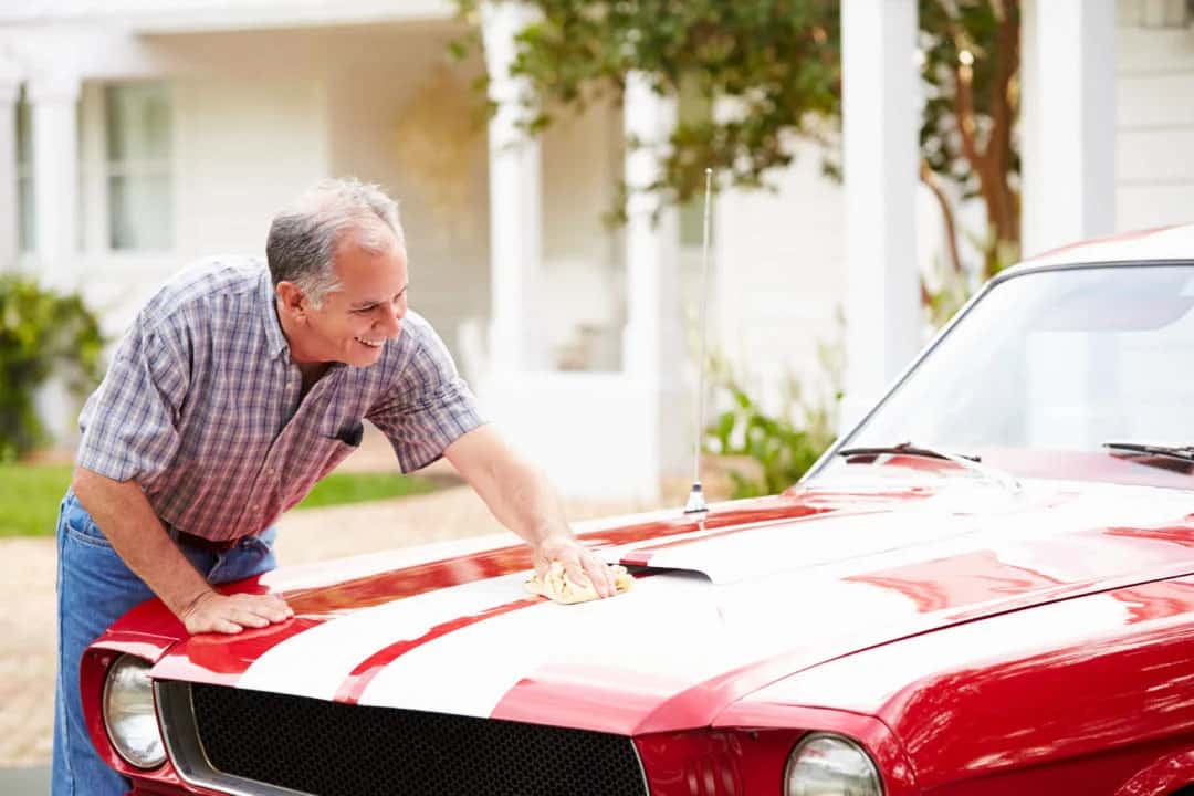 Man waxing his car